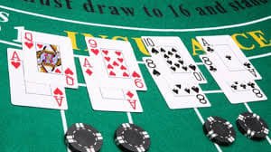 Mobile phone displaying live casino tables with roulette and dragon tiger games